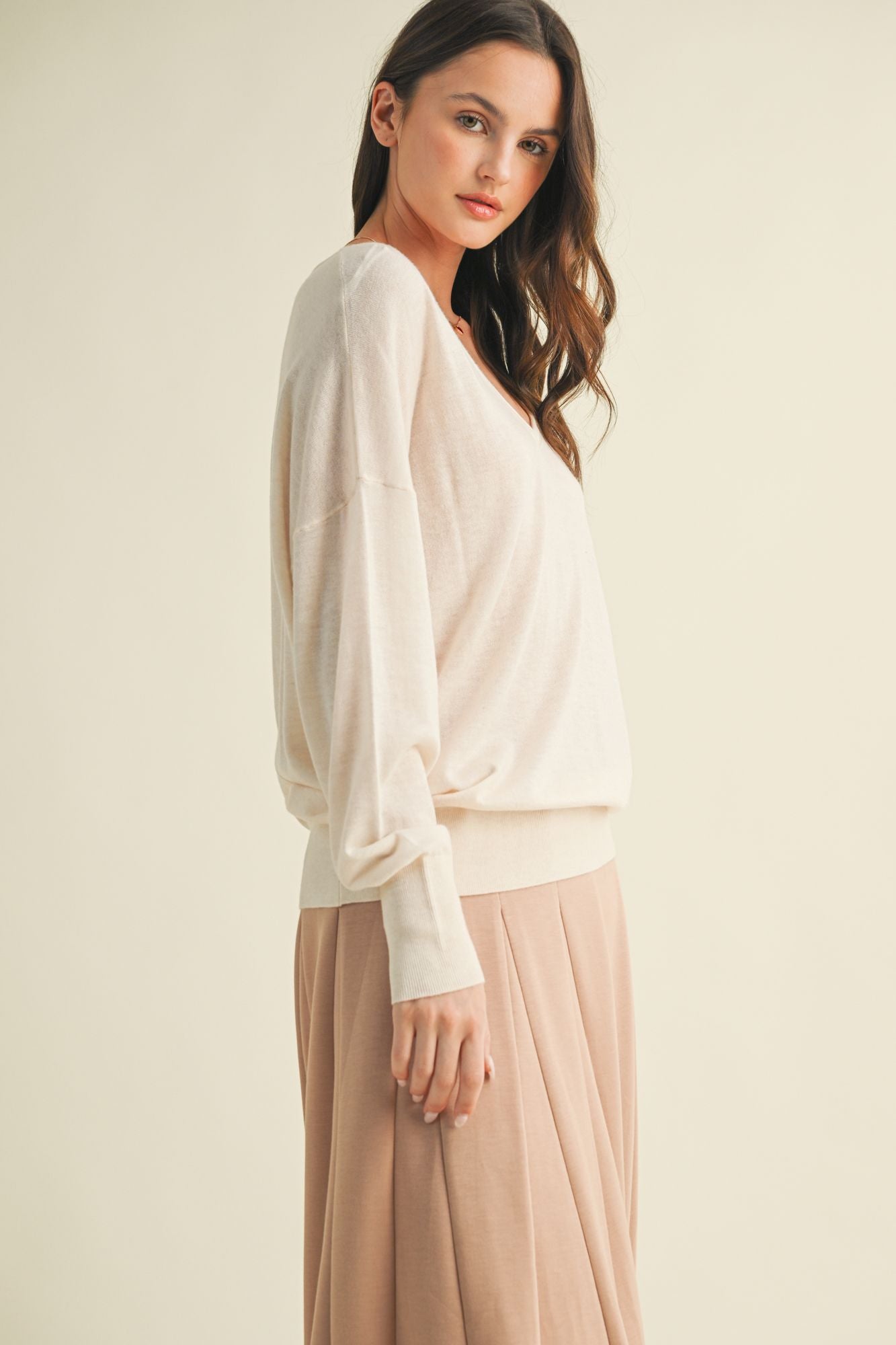 The Saddle Cream Sweater