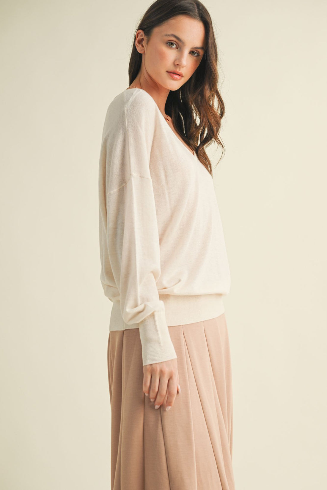 The Saddle Cream Sweater