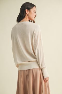The Saddle Cream Sweater